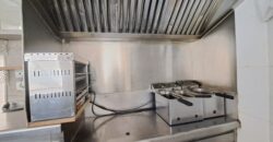¡Local cantoner al centre de Rubí, 54 m² ideals per al teu negoci amb aparador i sortida de fums!